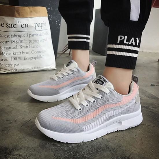 grey shoes with pink stripes