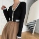 Soft Waxy Button Closure Cardigan Style Long Sleeve Sweater - Black image