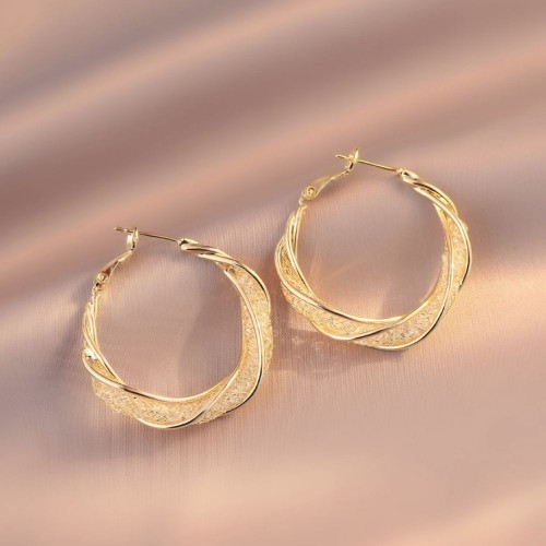 Stylish Gold Hoop Earrings with a Unique Twist Design image
