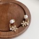 Elegant Gold Flower Earrings With Delicate Pearls image