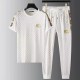 Men's White T-Shirt And Jogger Set With Gold Stripes image